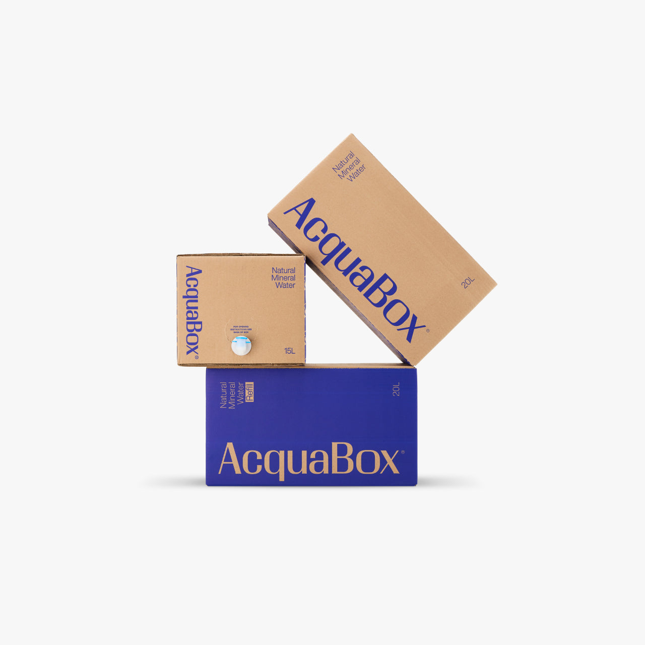 Stack of AcquaBox Natural Mineral Water bag-in-box dispensers in 10L, 15L and 20L sizes, recyclable packaging by Mountain Falls